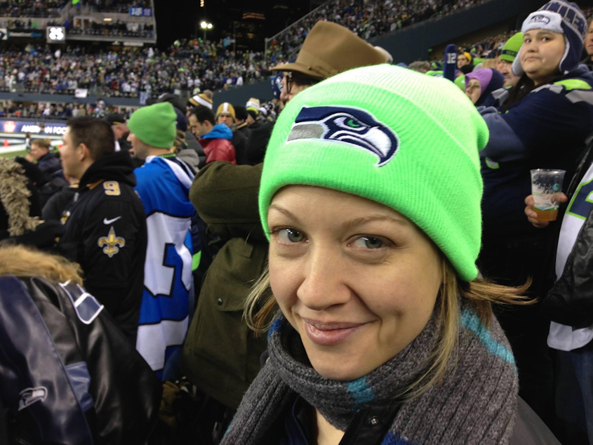 caption: Andrea Thomas Churna attending a sports game.