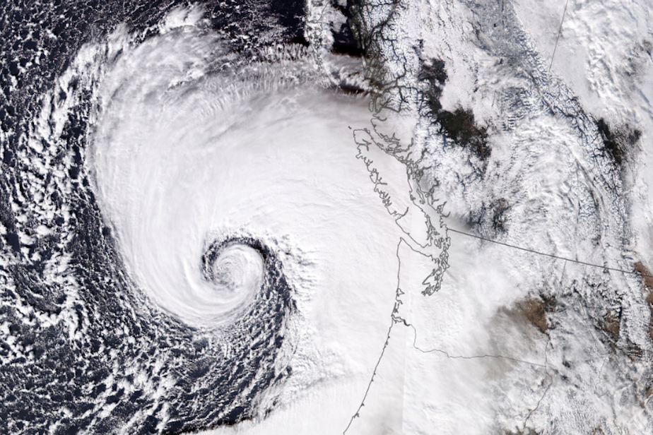 caption: A destructive bomb cyclone above the Northeast Pacific Ocean approaches the Canada-United States border on Nov. 19, 2024.